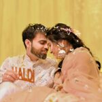 Couple enjoys an intimate moment during traditional Haldi ceremony.